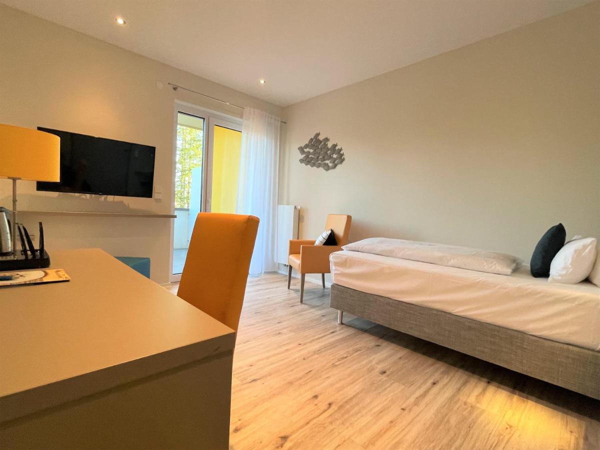 Bernsteinsee Hotel Sassenburg Bagian luar foto